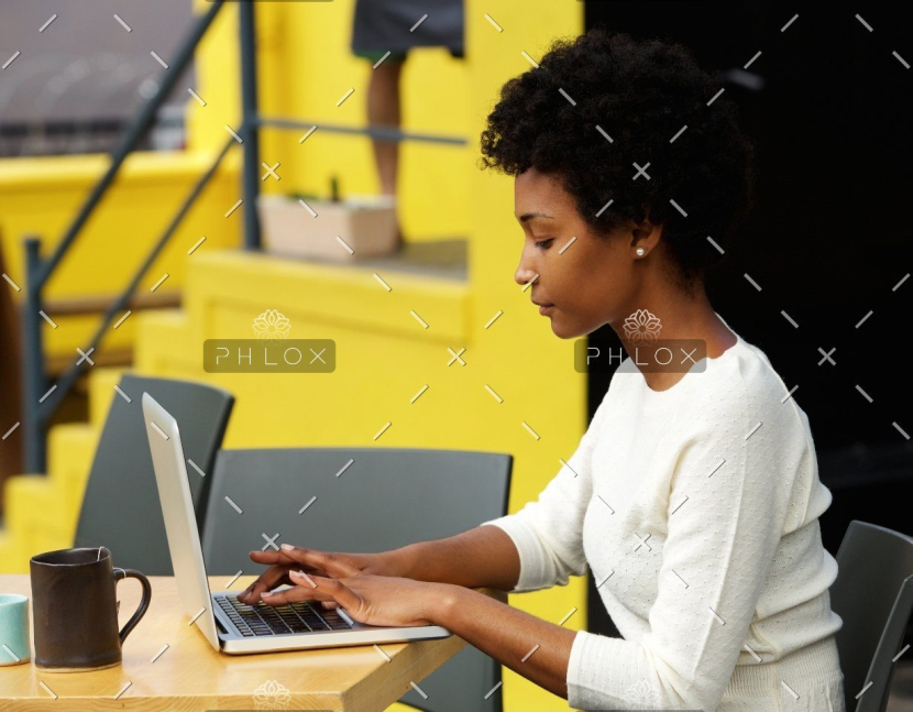 demo attachment 1082 attractive young woman using laptop outside p9rlfgu@2x